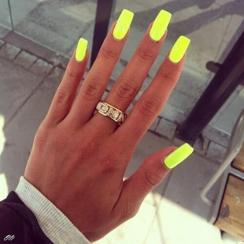 left hand with neon color nails