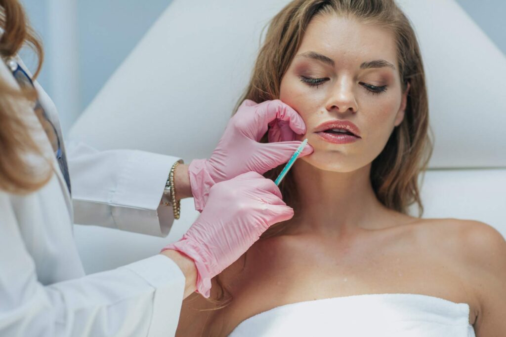 front view of a patient about to be injected with dermal fillers