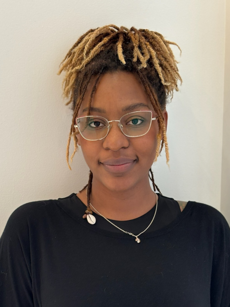 Portrait of Cleo standing at Anushka Salon and Spa