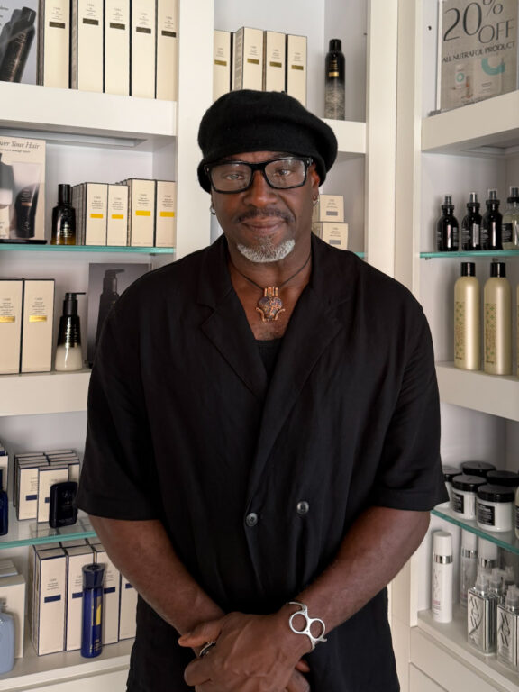 Greg, a senior stylist at Anushka Spa & Salon in West Palm Beach, Florida, poses for his headshot.